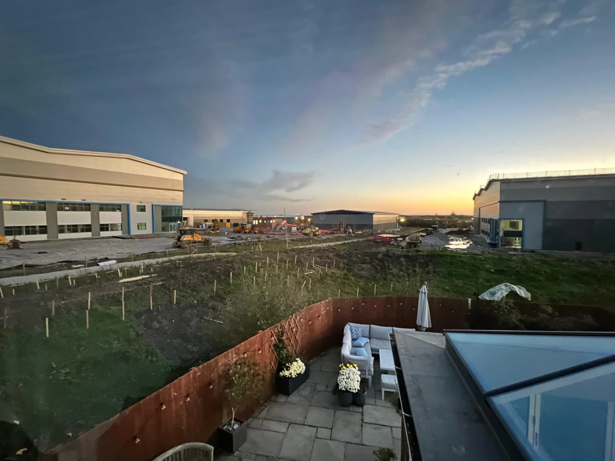 Astley Business Park at dusk, seen from the neighbouring garden the survey measured from
